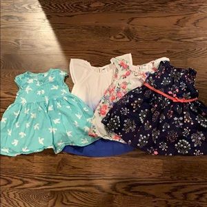 Lot of baby girl summer dresses.